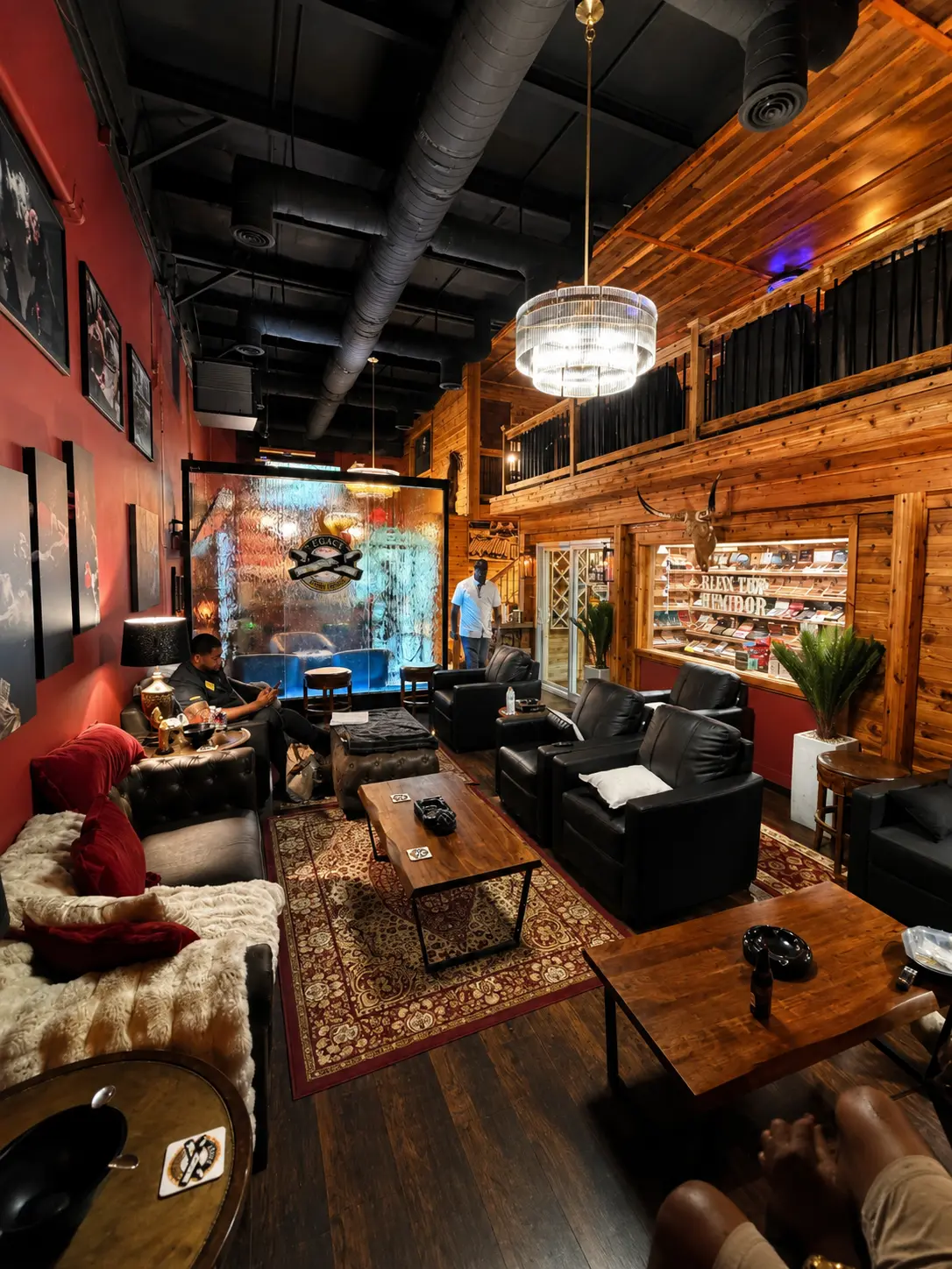 Lounge seating beside the walk-in humidor at Legacy Lounge
