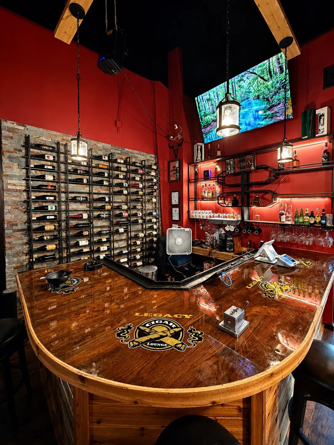 Legacy Lounge bar top with wine wall behind it