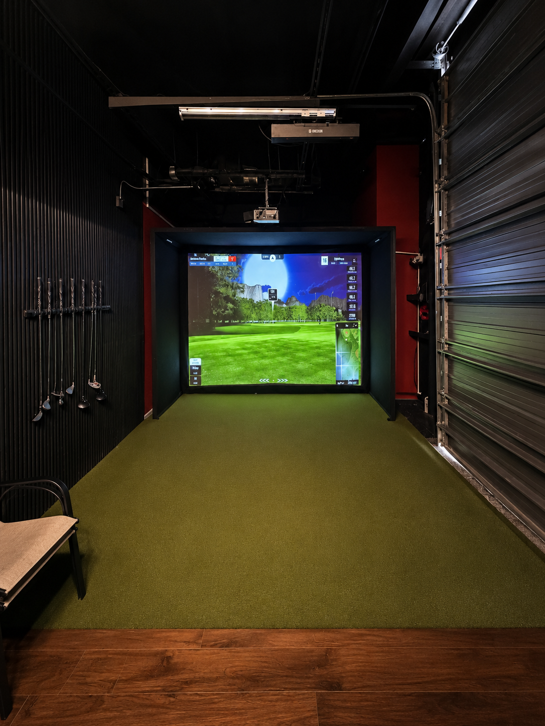 Golf simulator bay at Legacy Lounge