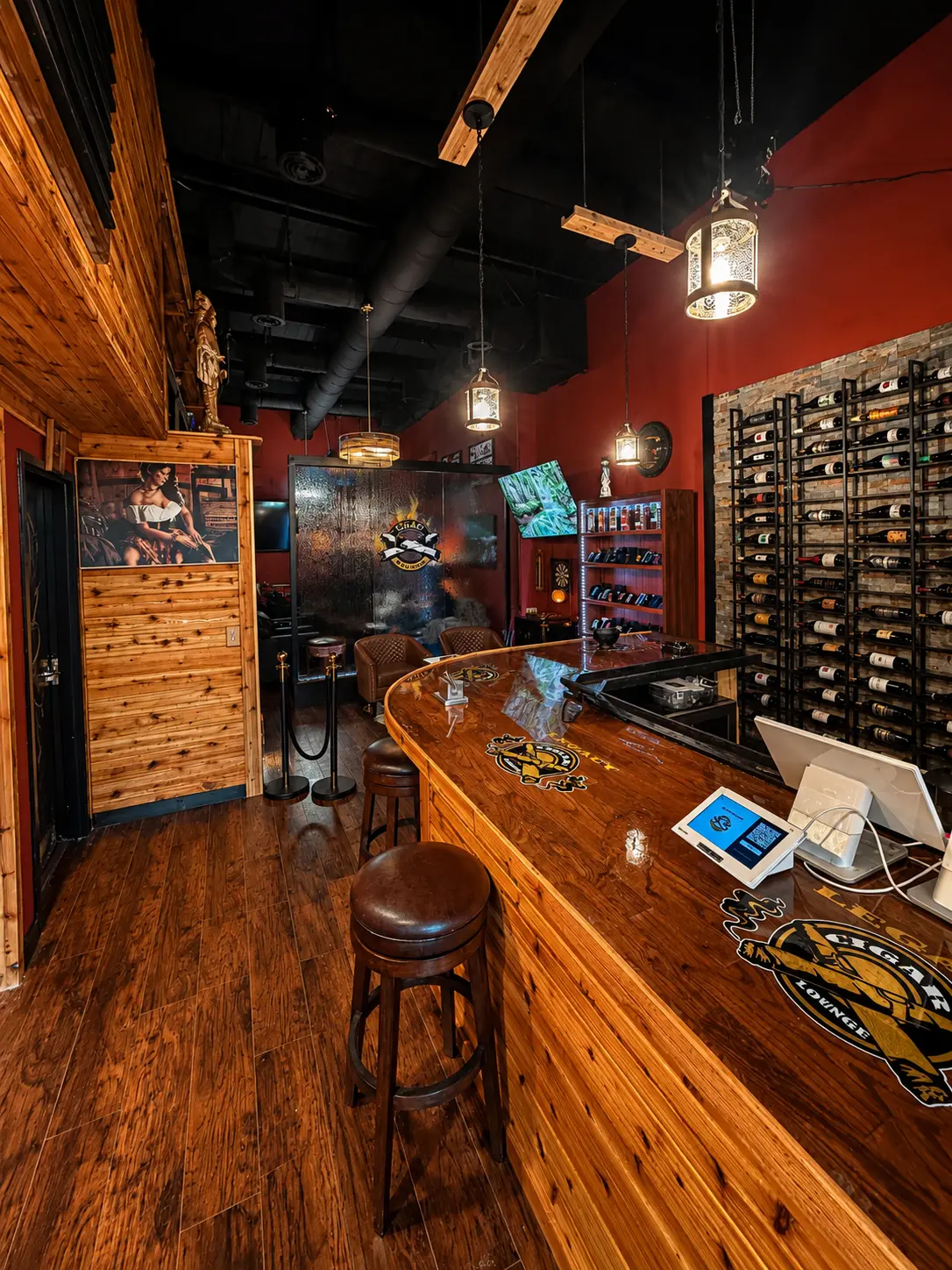 Front of the Legacy Cigar Lounge bar with branded bar top